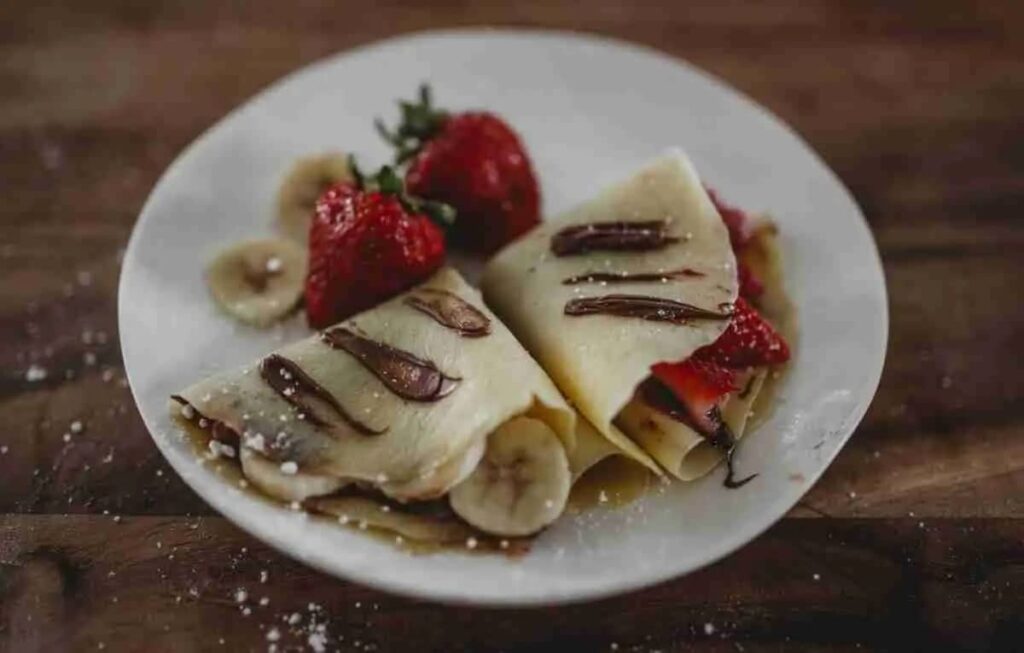 These healthy almond milk crepes recipe (dairy-free), made with only six basic ingredients, are a lovely dairy-free option. You can have them for breakfast or dessert.